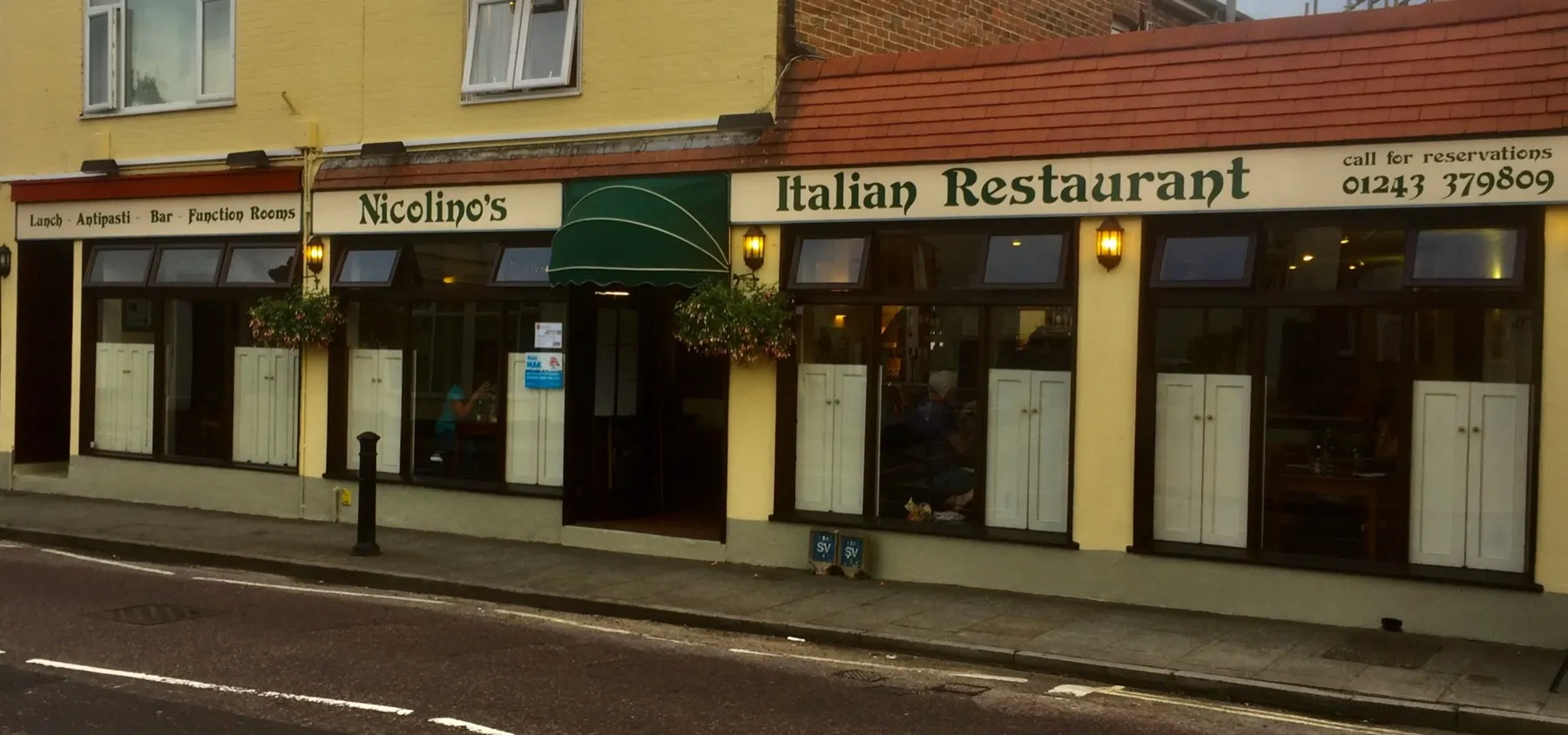 The green fronted exterior of Nicolino's Italian Restaurant on North Street, Emsworth
