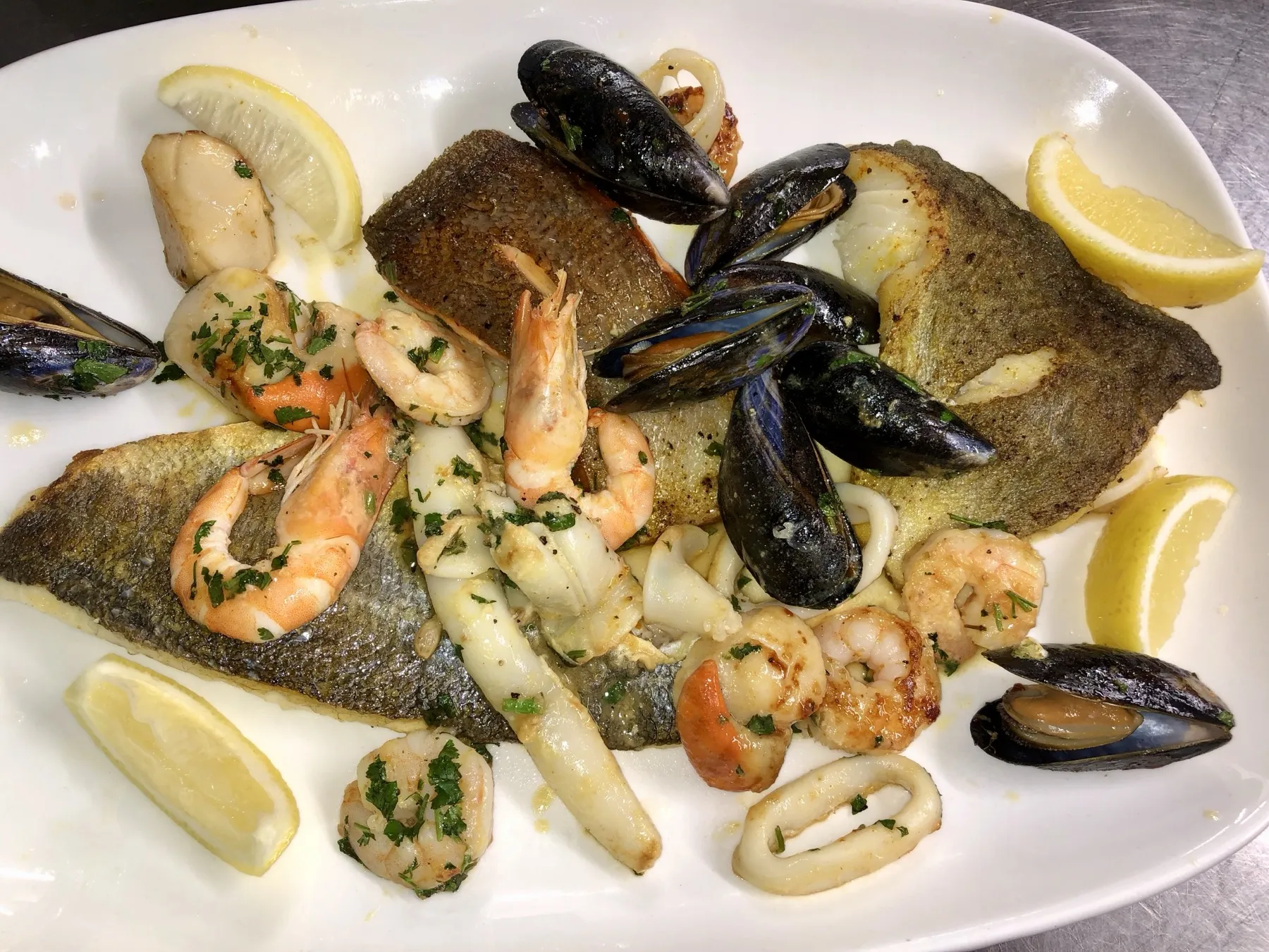 Pan seared seabass with mussels and king prawns